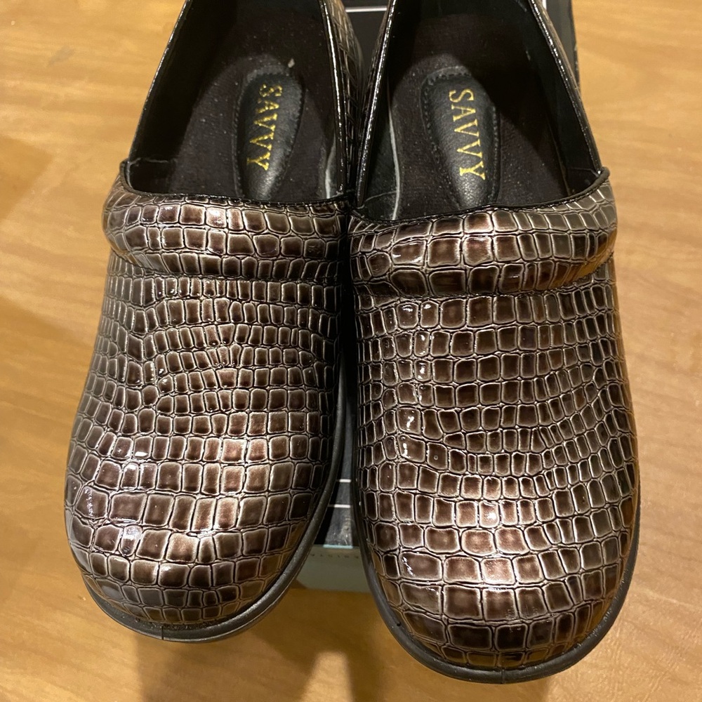 Savvy brand clog style slip in shoes. Faux alligator, brown patent leather.